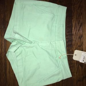green shorts